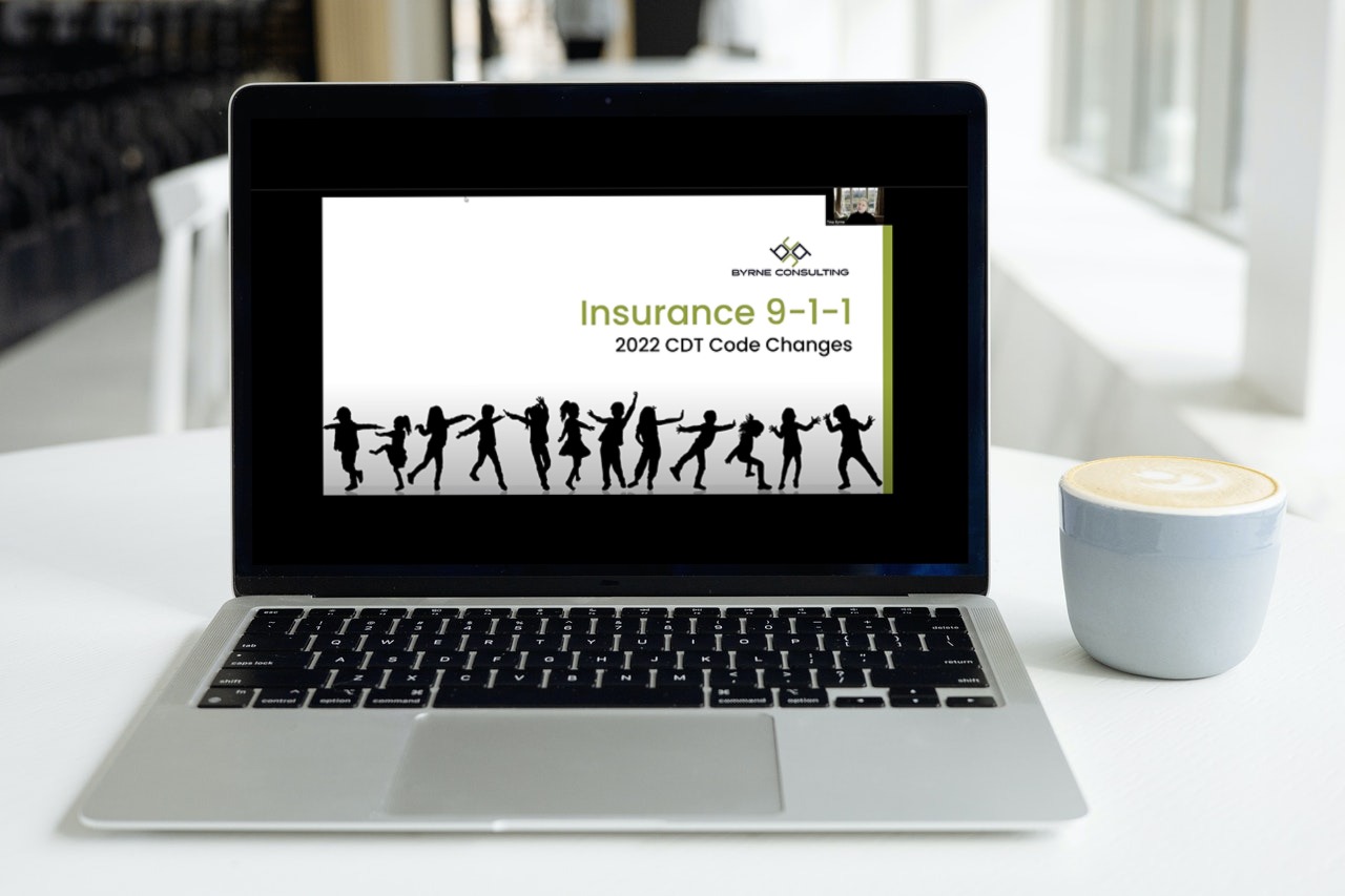 Webinar title card displayed on a laptop